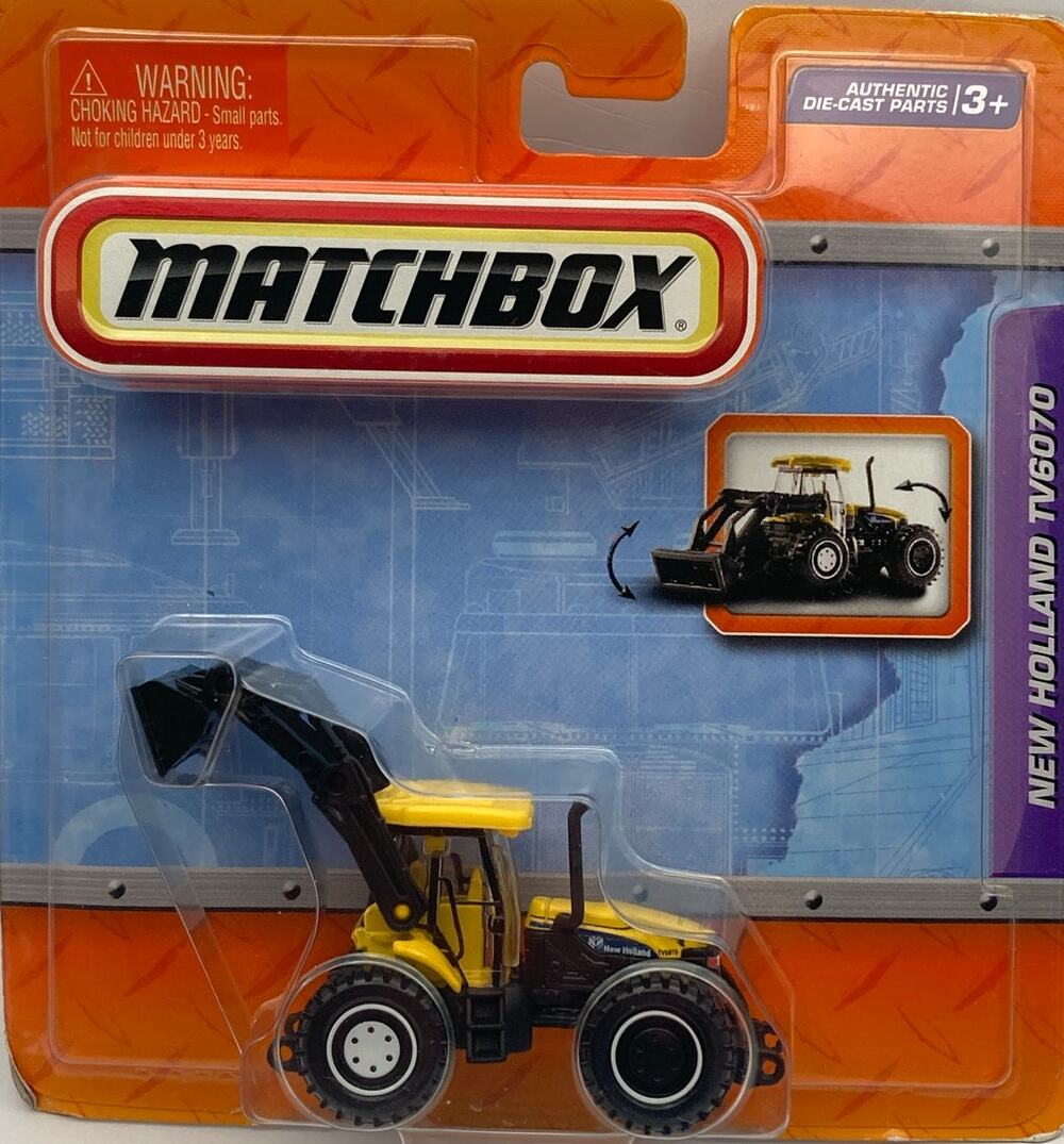 2010 Matchbox Real Working Parts Rigs Diecast New Holland TV6070 Yellow NIP